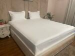Messaline white satin stripe bedsheet side angle